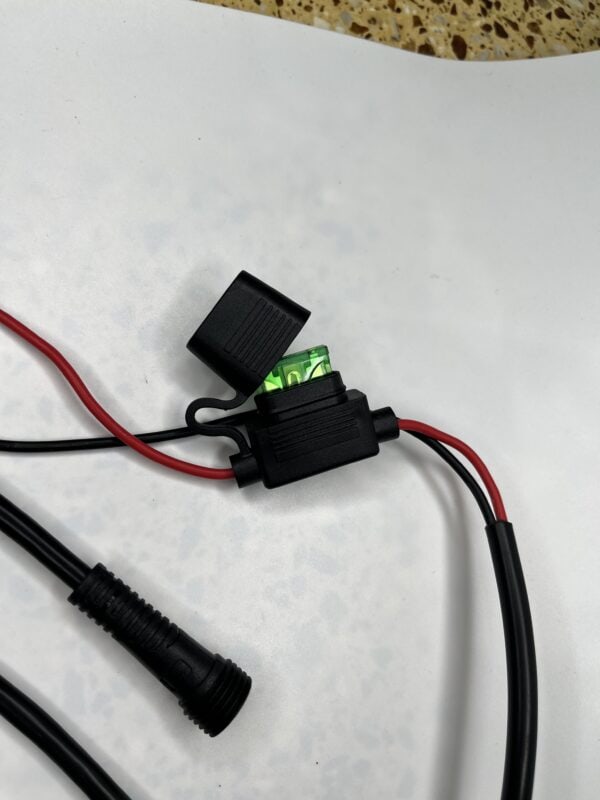 LED indicator and wiring component for electric bike or scooter, used in motorized vehicle electrical systems.