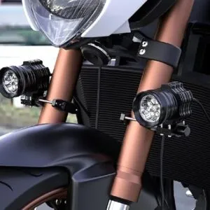 High-quality motorcycle front suspension with LED auxiliary lights and modern design, ideal for urban commuting and touring on Indian roads, showcased by Ride India Ride.