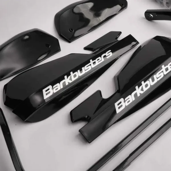 High-quality black motorcycle fairings with Barkbusters branding, designed for motorcycle protection and customization, suitable for ride Indian bikes and adventures.